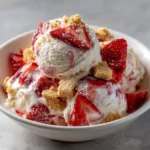 Delicious strawberry shortcake ice cream topped with fresh strawberries